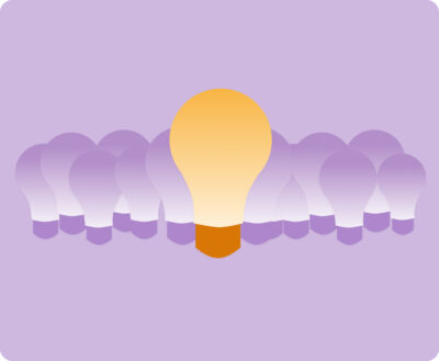 A visual concept of one prominent glowing lightbulb standing out from a group, representing active competitor new product launch tracking and market trend analysis.